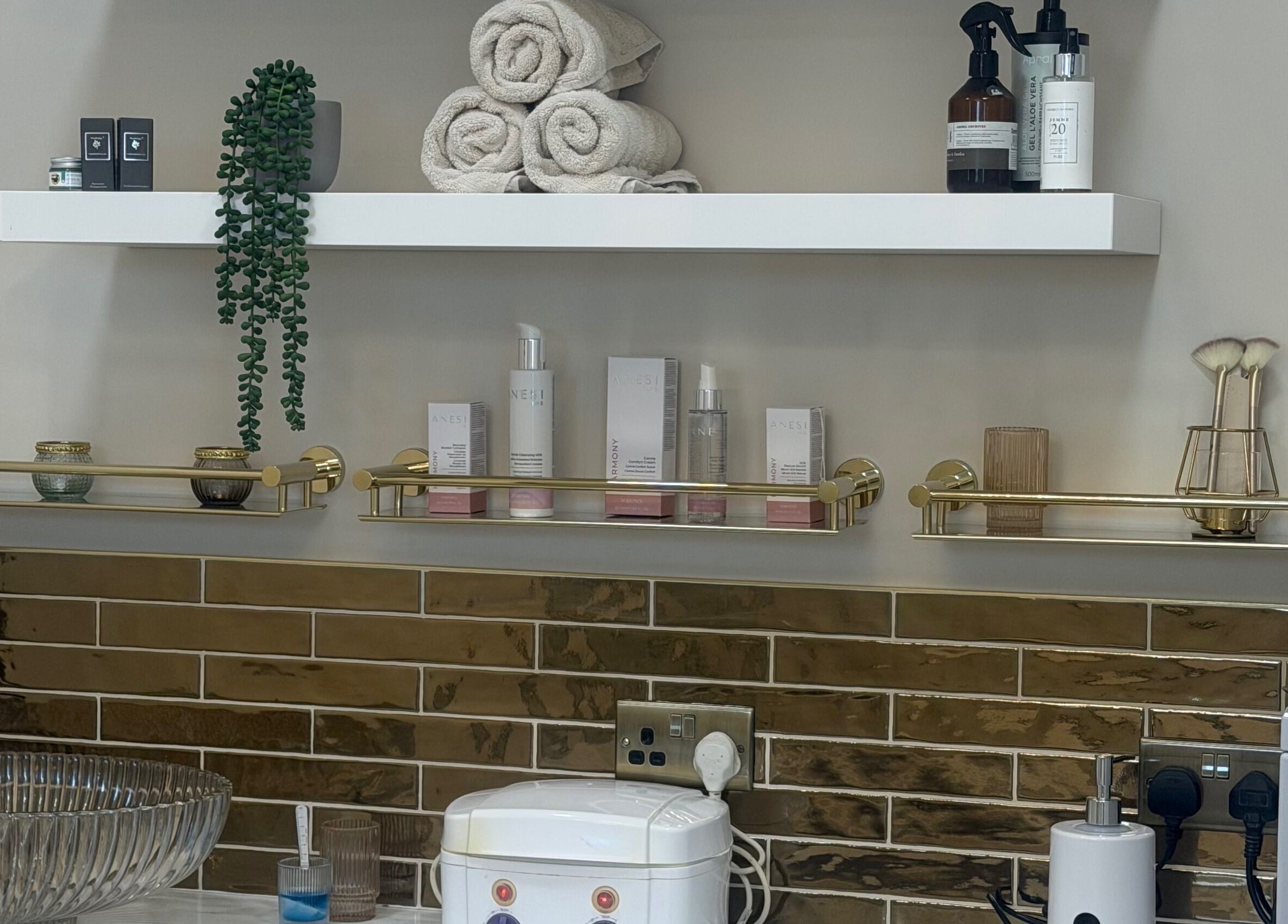 Stylish skincare shelves at Polished Beauty, Telscombe Cliffs, England, GB, showcasing premium beauty products.