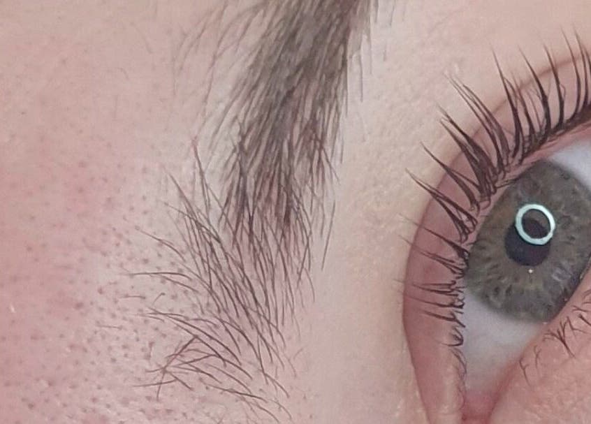 Close-up of a beautifully styled eye at Lioness' Den, Elland, England, GB showcasing detailed lash work.