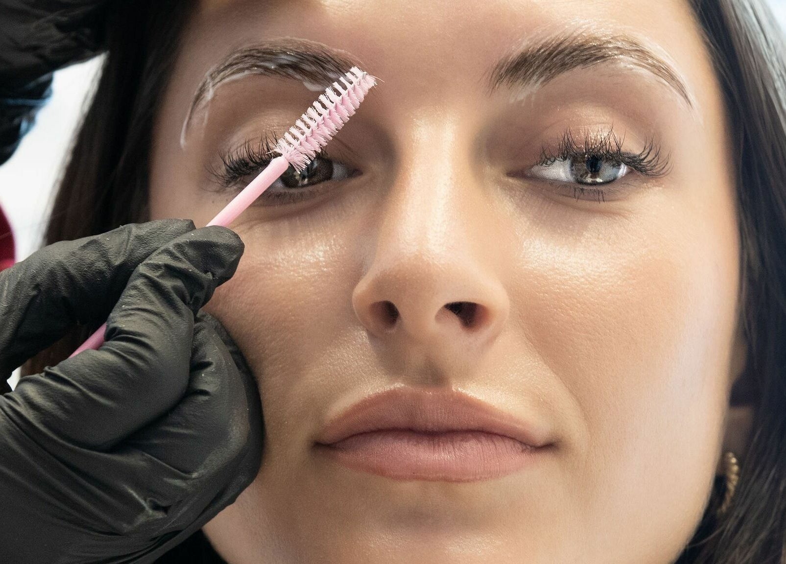 Eyebrow grooming at Glam by Dang in New York, New York, US for defined and polished brows.