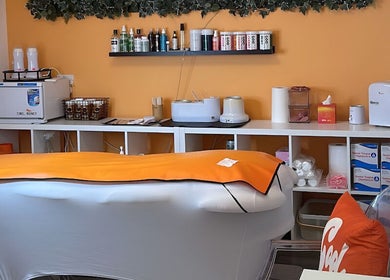 Treatment room at Peach Wax Studio in Kelso, Scotland, GB, showcasing a cozy and inviting ambiance.