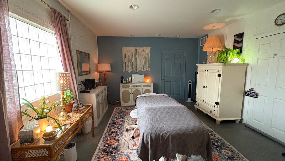 Relaxing massage room at Fusion Therapeutic Bodywork, Tucson, Arizona, US, with calming decor and ambient lighting.