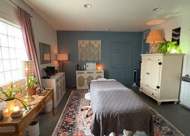 Relaxing massage room at Fusion Therapeutic Bodywork, Tucson, Arizona, US, with calming decor and ambient lighting.