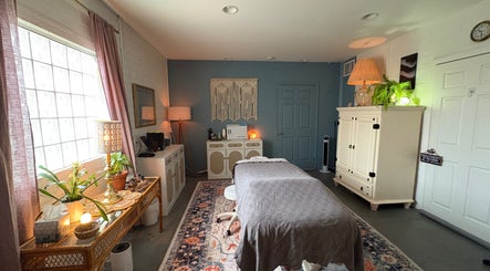 Relaxing massage room at Fusion Therapeutic Bodywork, Tucson, Arizona, US, with calming decor and ambient lighting.