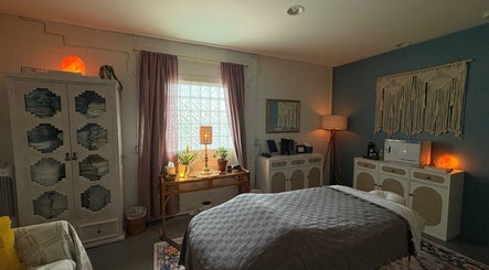 Relaxing room at Fusion Therapeutic Bodywork, Tucson, Arizona, US, featuring tranquil decor and cozy lighting.