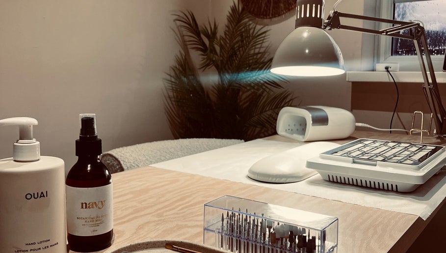 Nail care station at Jessica Beauty Babe Nails, Abercynon, Wales, GB, featuring lotions and manicure tools.