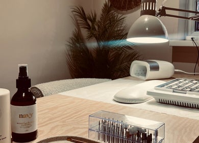 Nail care station at Jessica Beauty Babe Nails, Abercynon, Wales, GB, featuring lotions and manicure tools.
