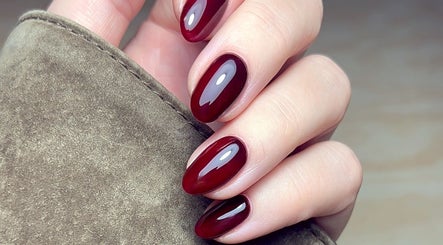 Elegant burgundy nails by Jessica Beauty Babe Nails in Abercynon, Wales, GB. Perfect for a polished look.