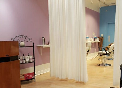 Relaxing interior of Bella Spa in Omaha, Nebraska featuring elegant chairs and calming decor for ultimate tranquility.