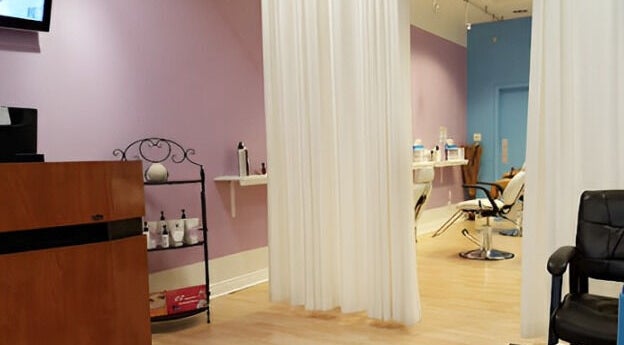 Relaxing interior of Bella Spa in Omaha, Nebraska featuring elegant chairs and calming decor for ultimate tranquility.