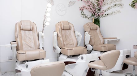 Elegant pedicure chairs at MW Nails and Beauty Salon in London, England, GB, offering a serene atmosphere.