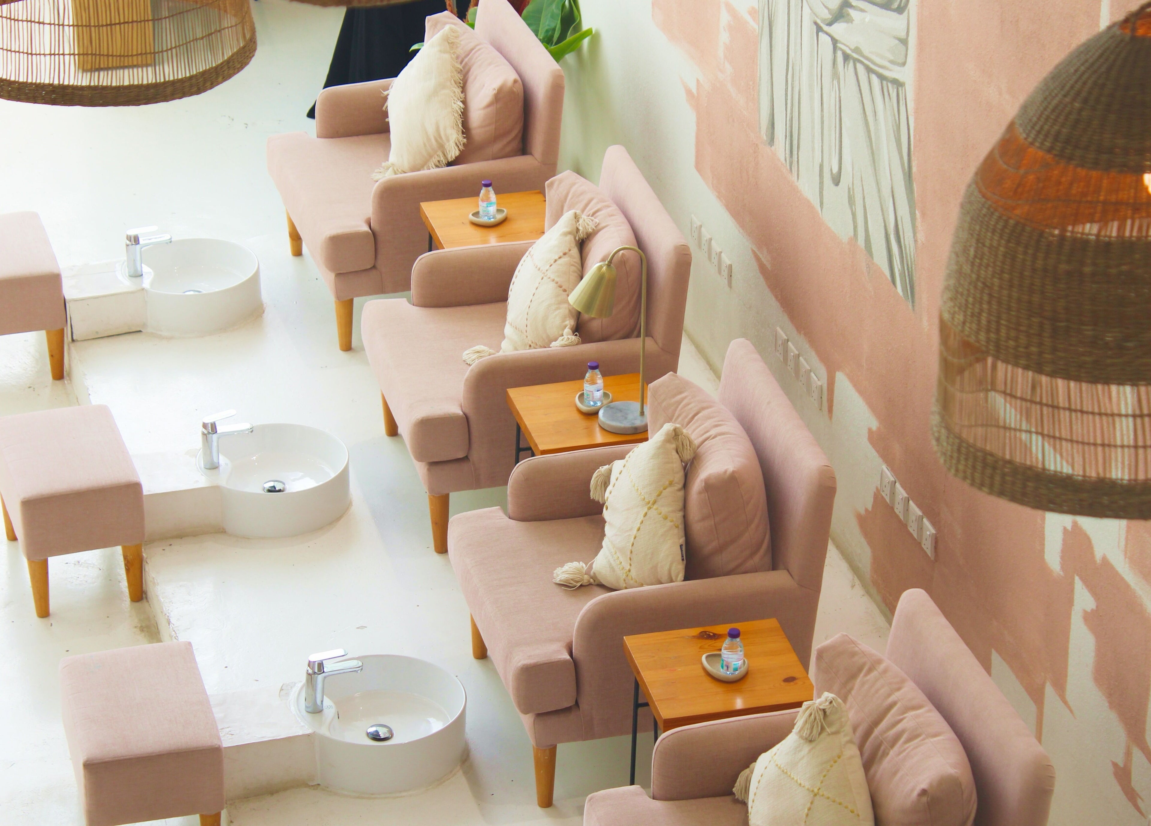 Luxurious pedicure lounge at Nash ناش, Riyadh, Riyadh Province, SA with plush seating and serene decor.