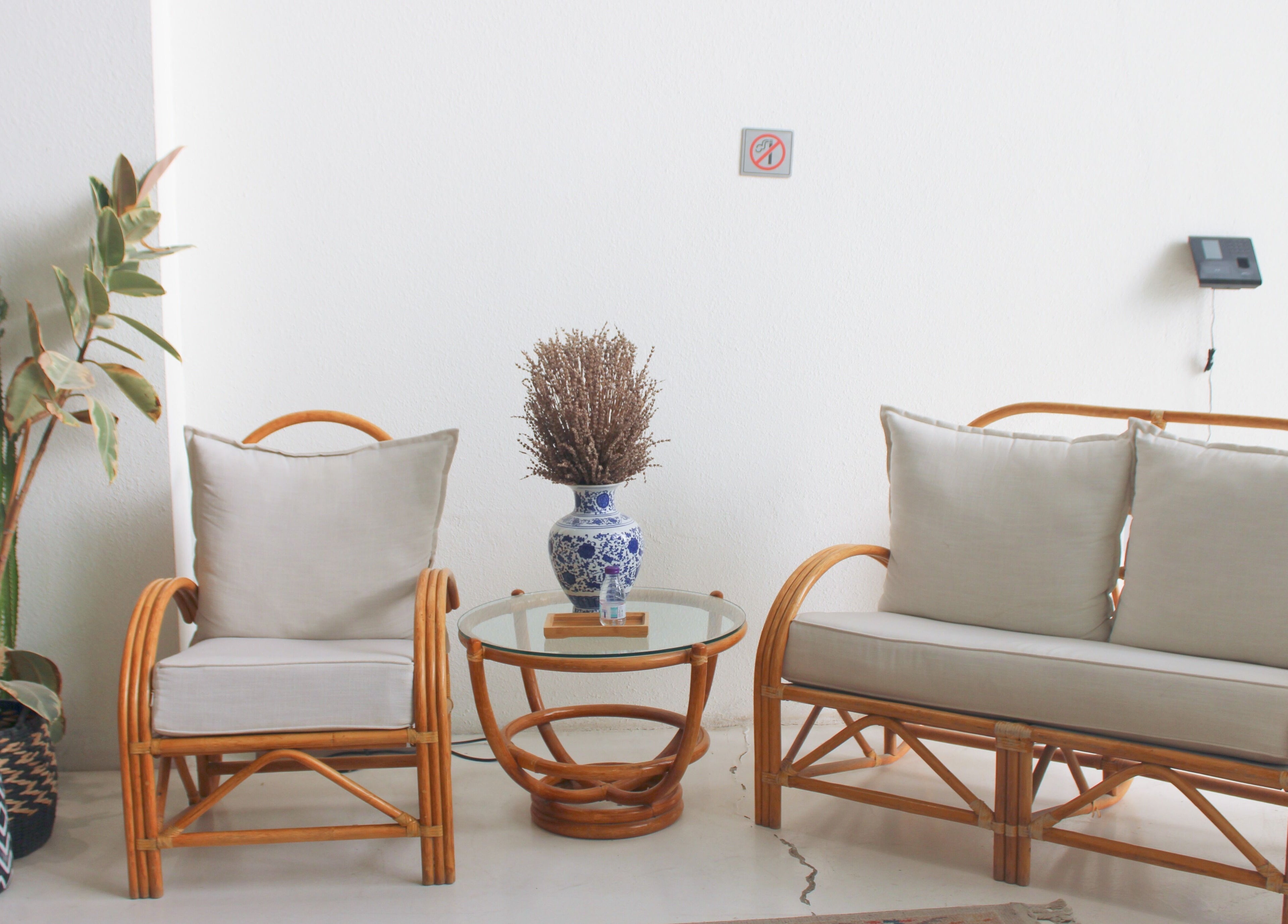 Elegant seating area with rattan furniture at Nash ناش, Riyadh, Riyadh Province, SA.