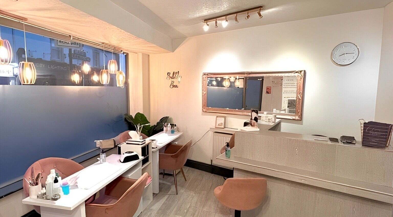 Interior of Glow Aesthetics & Beauty in Liversedge, England, GB, showcasing elegant and calming nail salon setting.