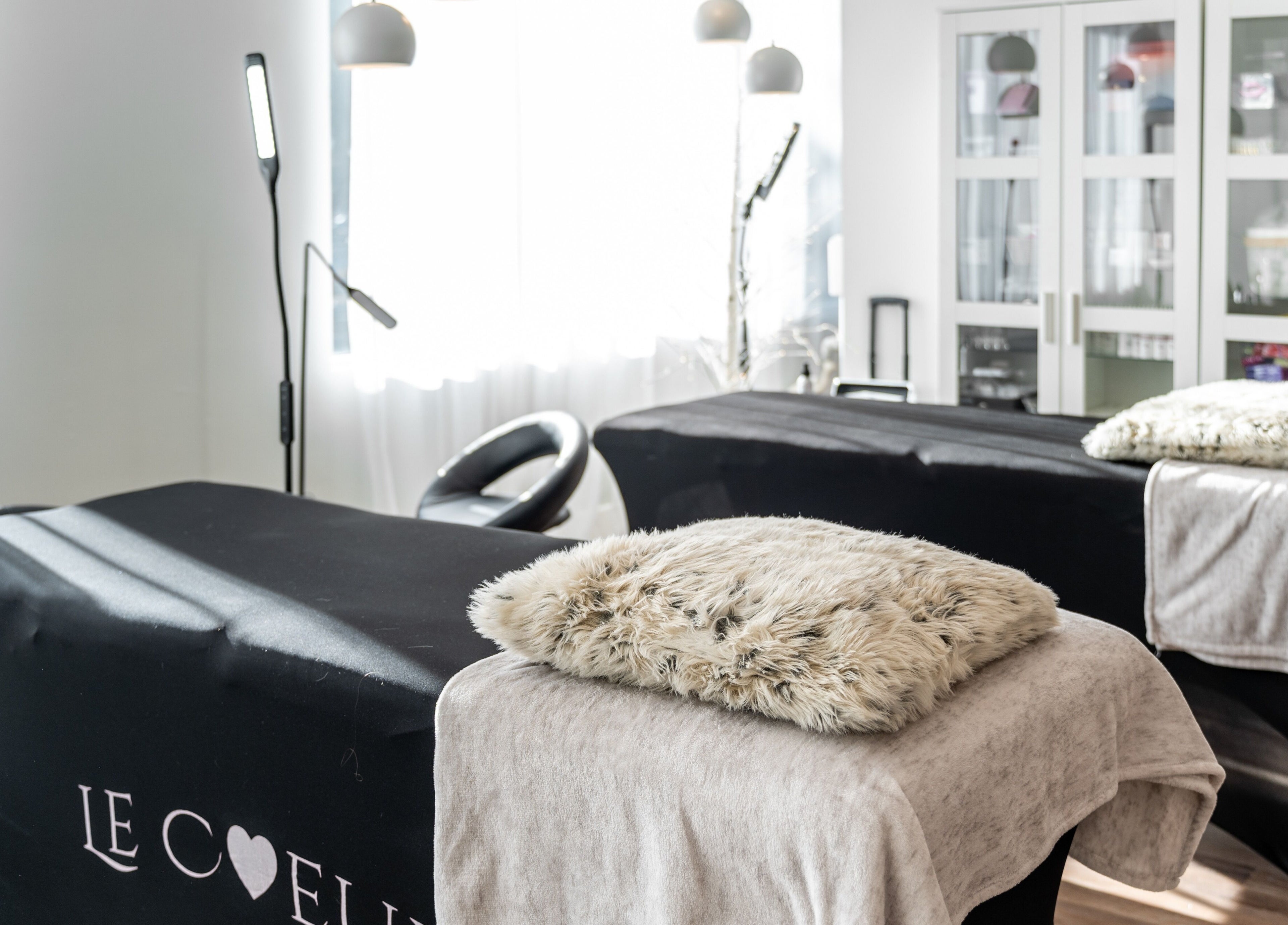Cozy treatment area at Blink & Brow Co. BROOKSWOOD, Langley Township, British Columbia, CA, featuring plush décor.