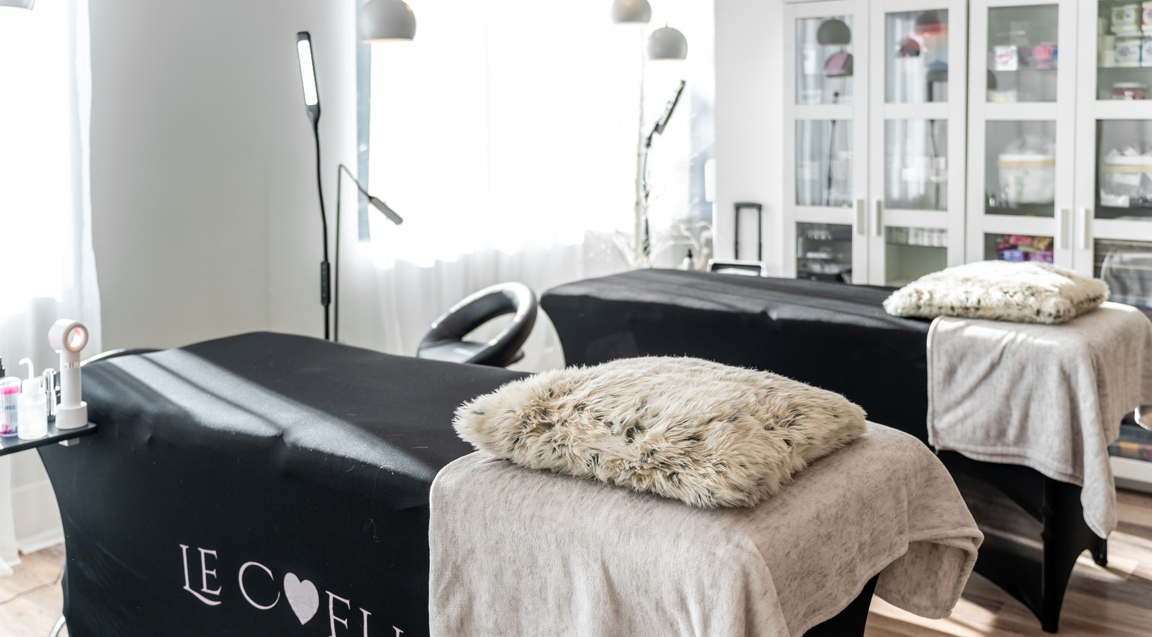 Cozy treatment area at Blink & Brow Co. BROOKSWOOD, Langley Township, British Columbia, CA, featuring plush décor.