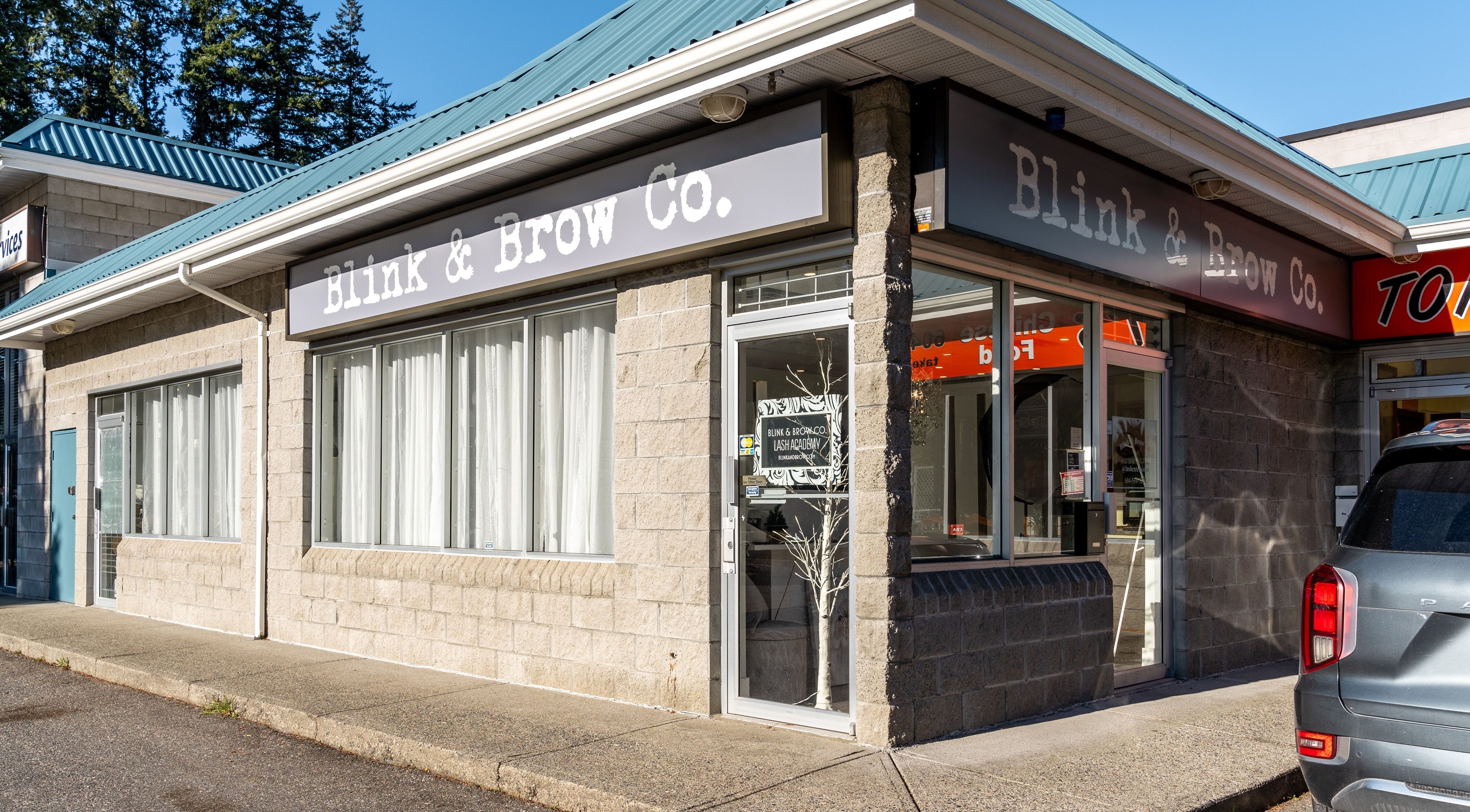 Blink & Brow Co. BROOKSWOOD in Langley Township, British Columbia, CA, showcasing a stylish entrance.