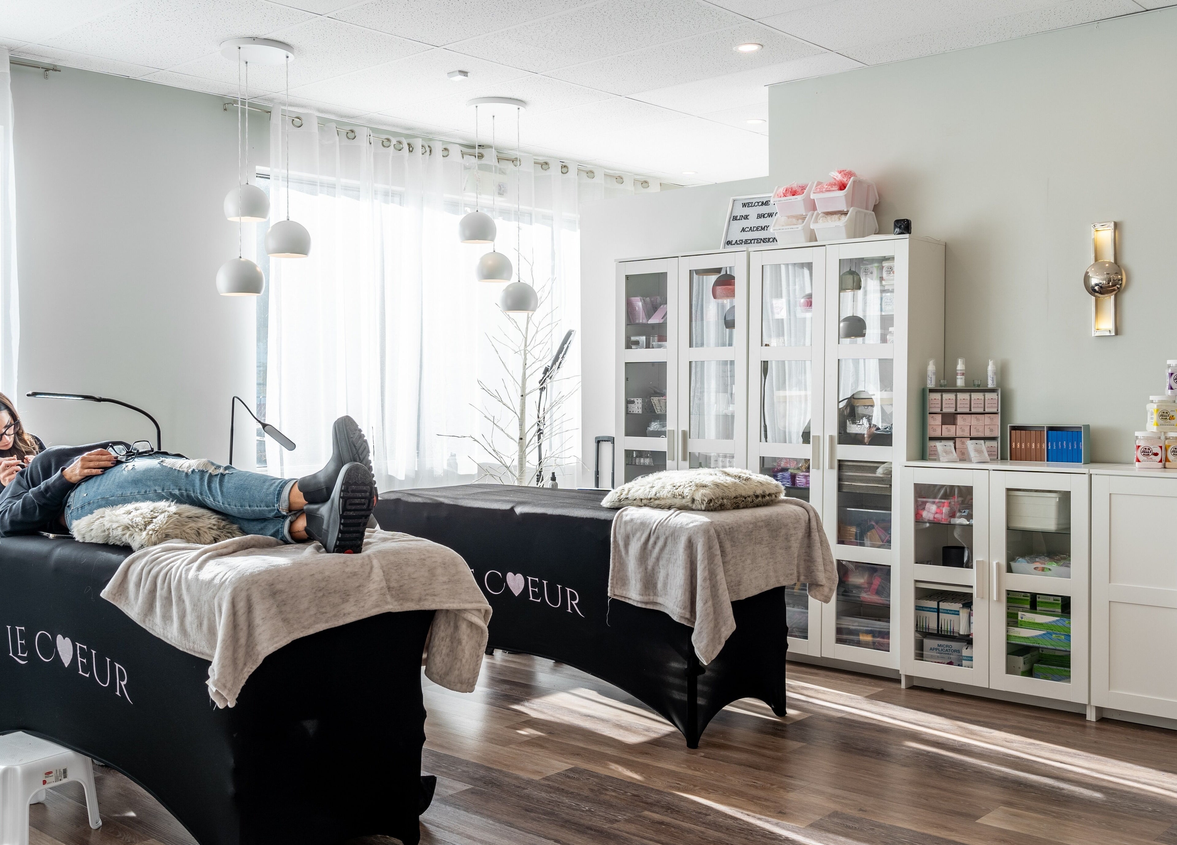 Interior of Blink & Brow Co. BROOKSWOOD in Langley Township, BC, CA with cozy treatment beds and calming decor.