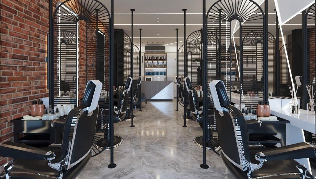 Modern barber chairs line Pointcut Barbershop, Riyadh, Riyadh Province, SA, showcasing sleek design.