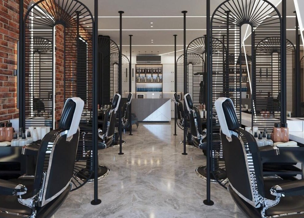 Modern barber chairs line Pointcut Barbershop, Riyadh, Riyadh Province, SA, showcasing sleek design.