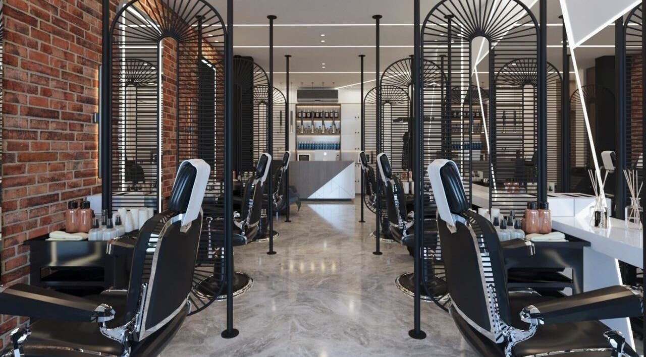 Modern barber chairs line Pointcut Barbershop, Riyadh, Riyadh Province, SA, showcasing sleek design.