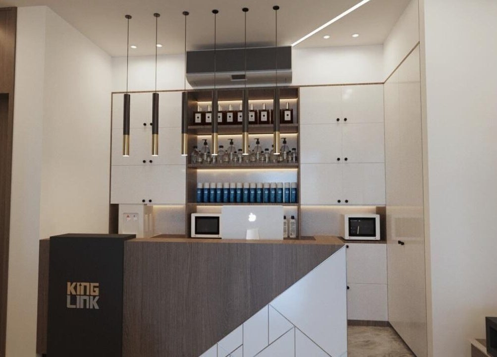 Modern reception at Pointcut Barbershop in Riyadh, Riyadh Province, SA with sleek design and elegant lighting.