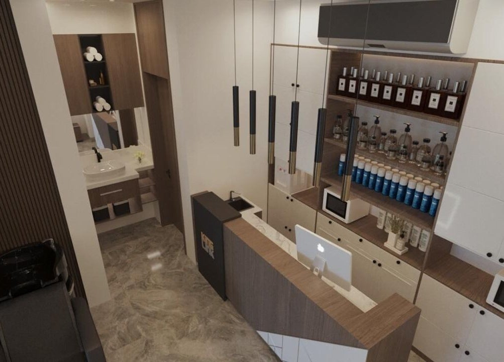 Modern interior of Pointcut Barbershop in Riyadh, Riyadh Province, SA with sleek shelves and stylish decor.