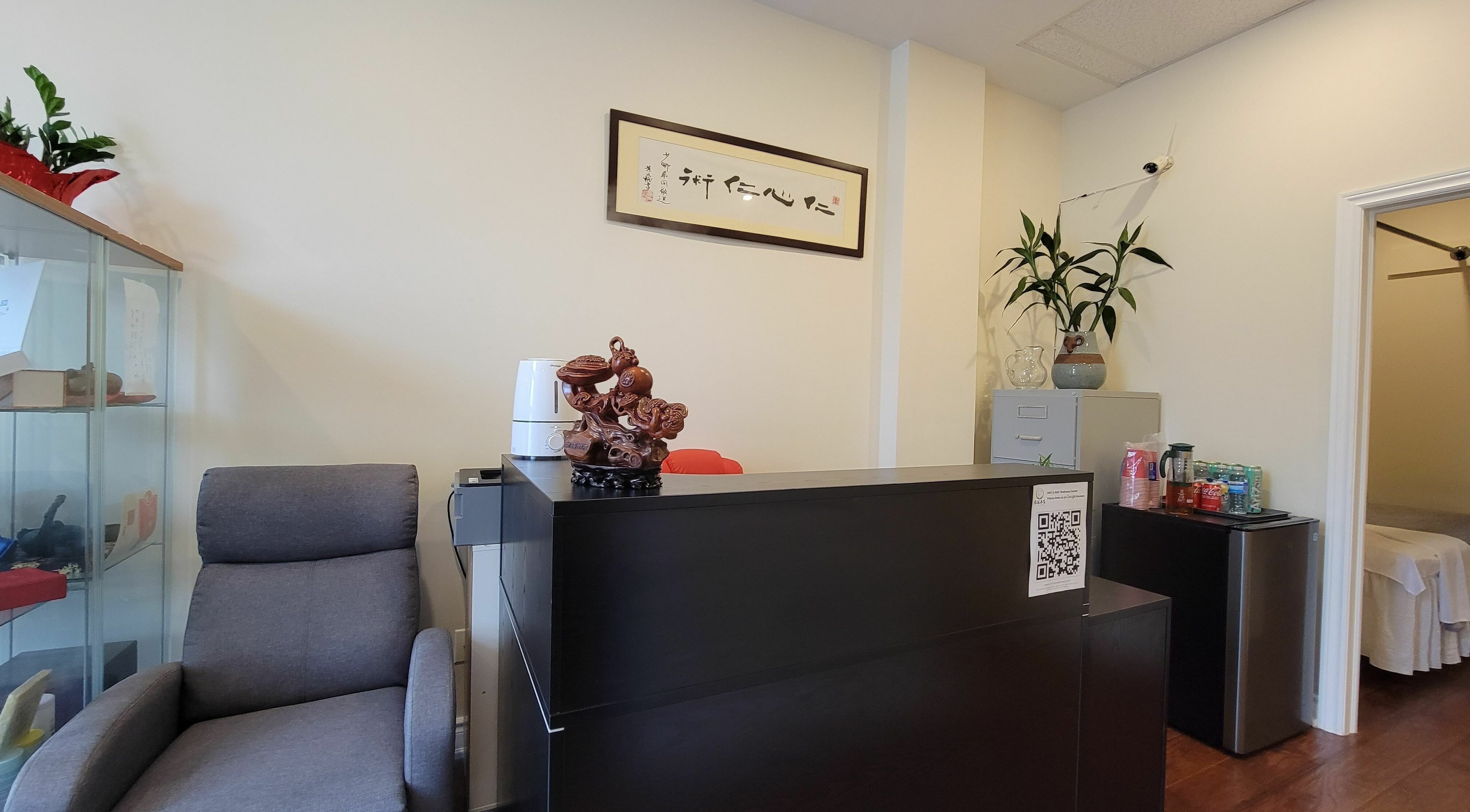 Cozy reception area at RMT & RAC Wellness Center, Markham, Ontario, CA with plants and seating.