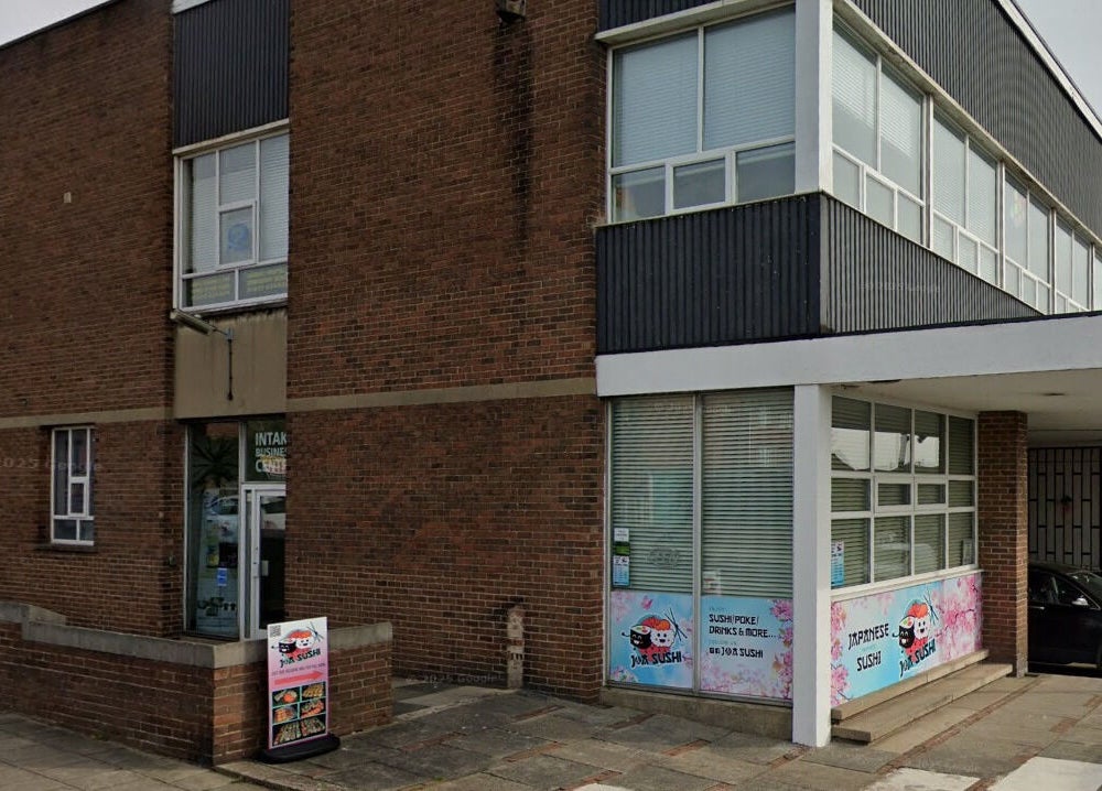 Exterior of Love T Waxing and Laser Specialist Studio in Mansfield, England, GB, showcasing modern brick architecture.