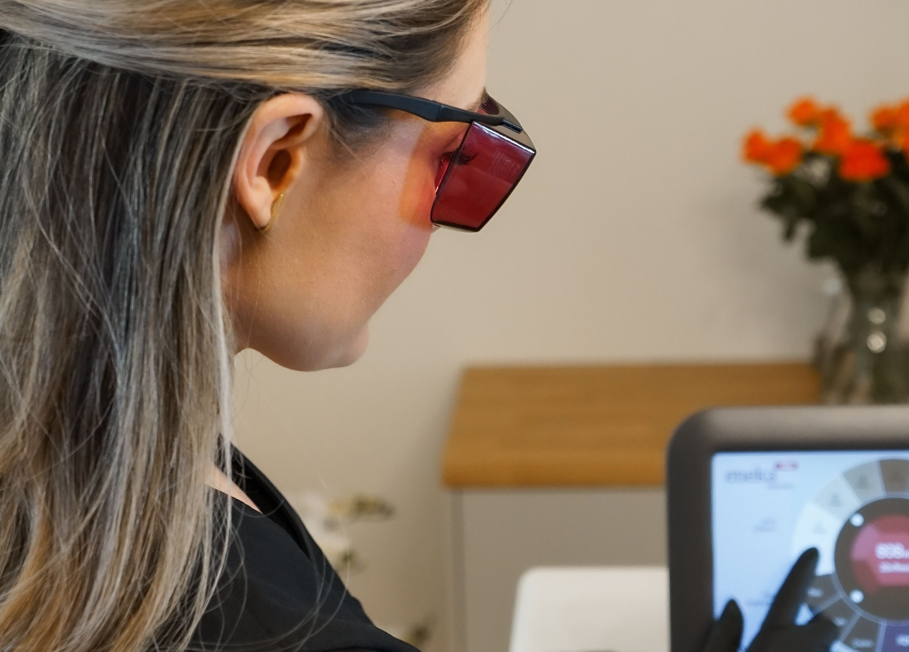 Technician using laser device at Love T Waxing and Laser Specialist Studio, Mansfield, England, GB.