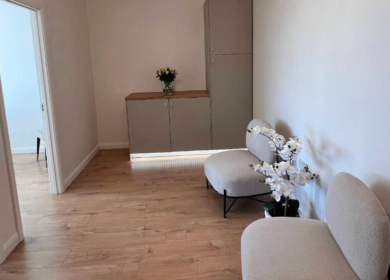 Cozy lounge area at Love T Waxing and Laser Specialist Studio in Mansfield, England, GB, with modern decor.