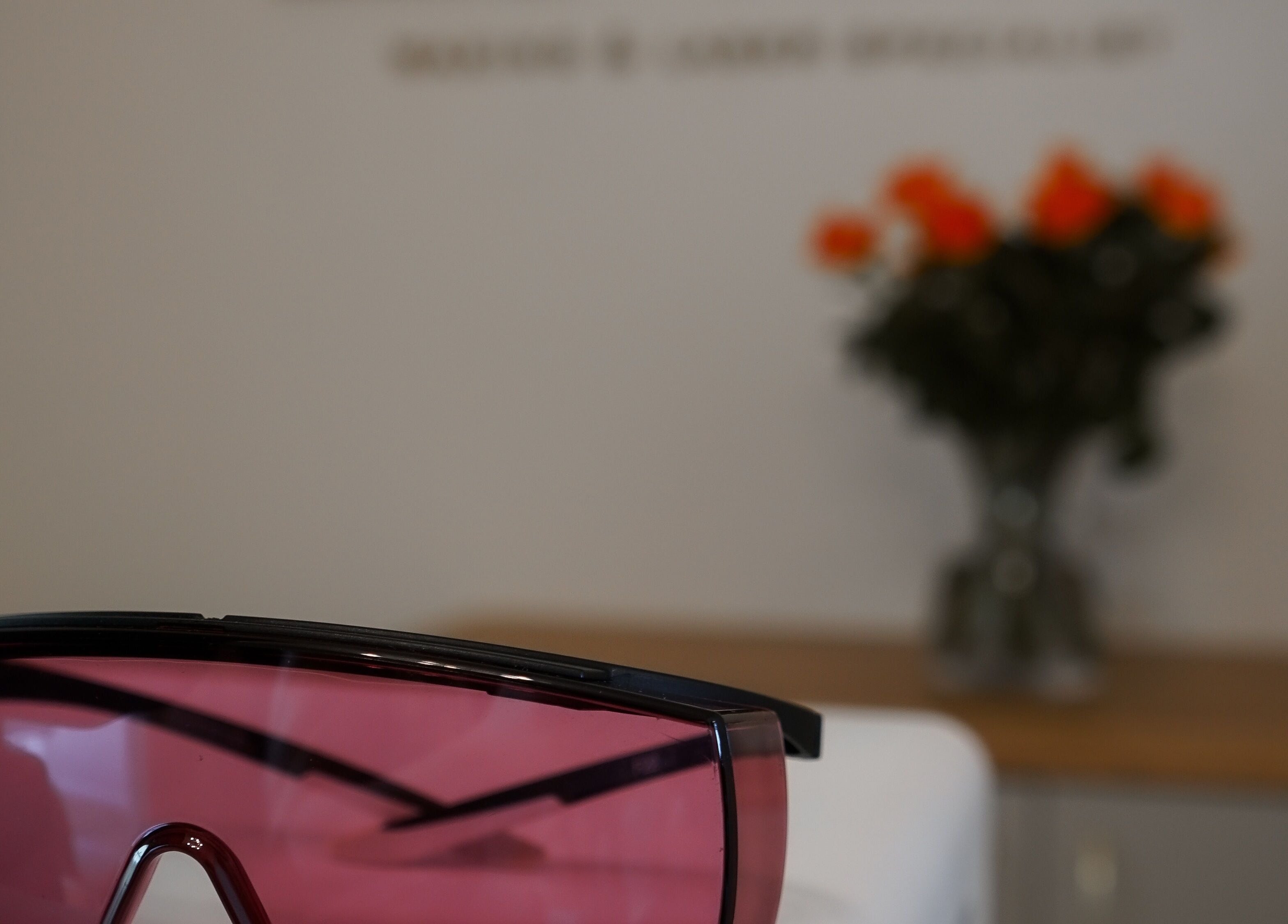 Protective pink visor at Love T Waxing and Laser Specialist Studio, Mansfield, England, GB with floral decor.