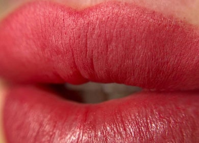 Close-up of bold red lips at Extraordinary Beauty Skills by Aleksandra Yaneva, Northwood, England, GB.