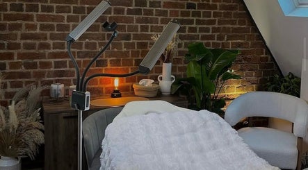 Relaxing treatment room at Twinning Hair & Beauty, featuring plush decor in Luton, England, GB.