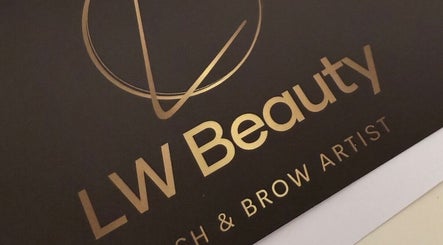 LW Beauty logo with gold lettering on a sleek black background, Dundee, Scotland, GB.