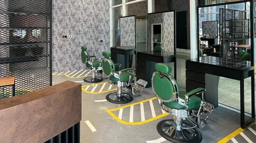 Elegant barber chairs at Project Hairway - Business Bay in Dubai, Dubai, AE, offering a modern salon ambiance.