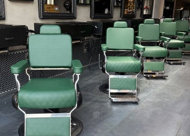 Sleek green chairs at Project Hairway - Jumeirah in Dubai, Dubai, AE, offering stylish beauty ambiance.
