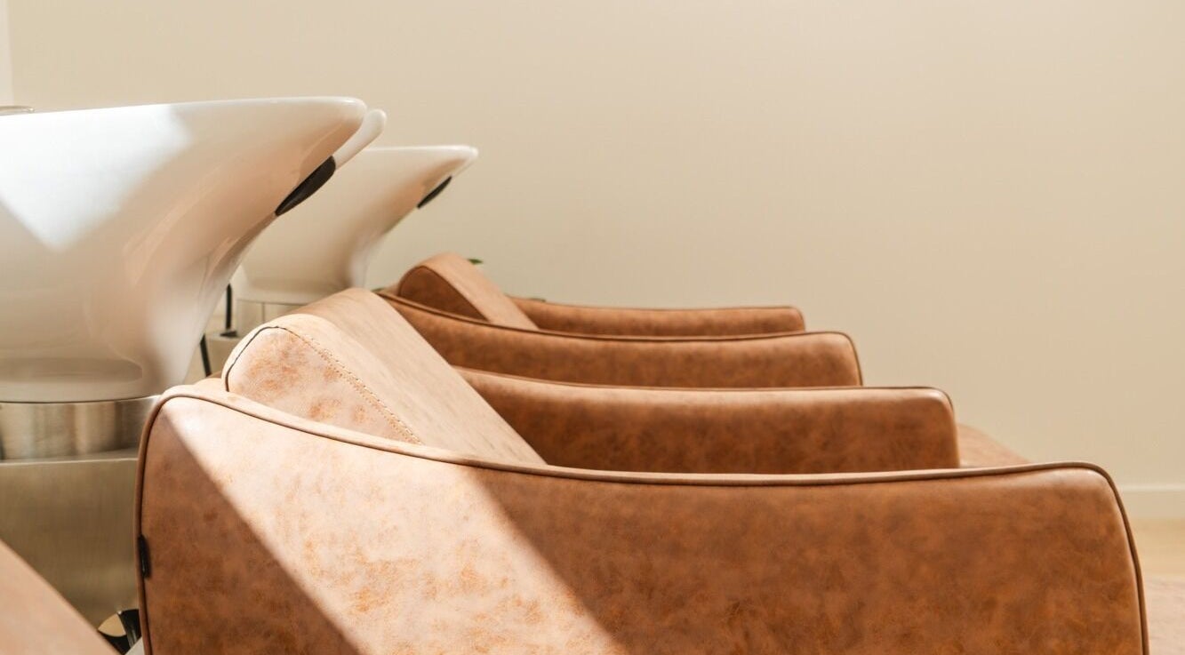 Stylish wash stations at The Mane Stylist in Red Hill, Queensland, AU reflect elegance and comfort.