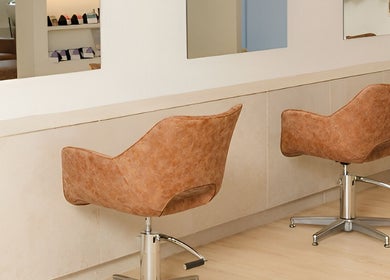 Stylish salon chairs at The Mane Stylist in Red Hill, Queensland, AU.