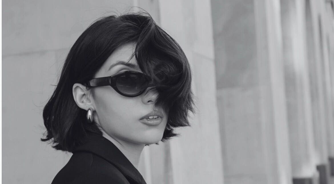 Stylish woman in sunglasses at David James | Marin, San Rafael, California, US showcasing modern elegance.