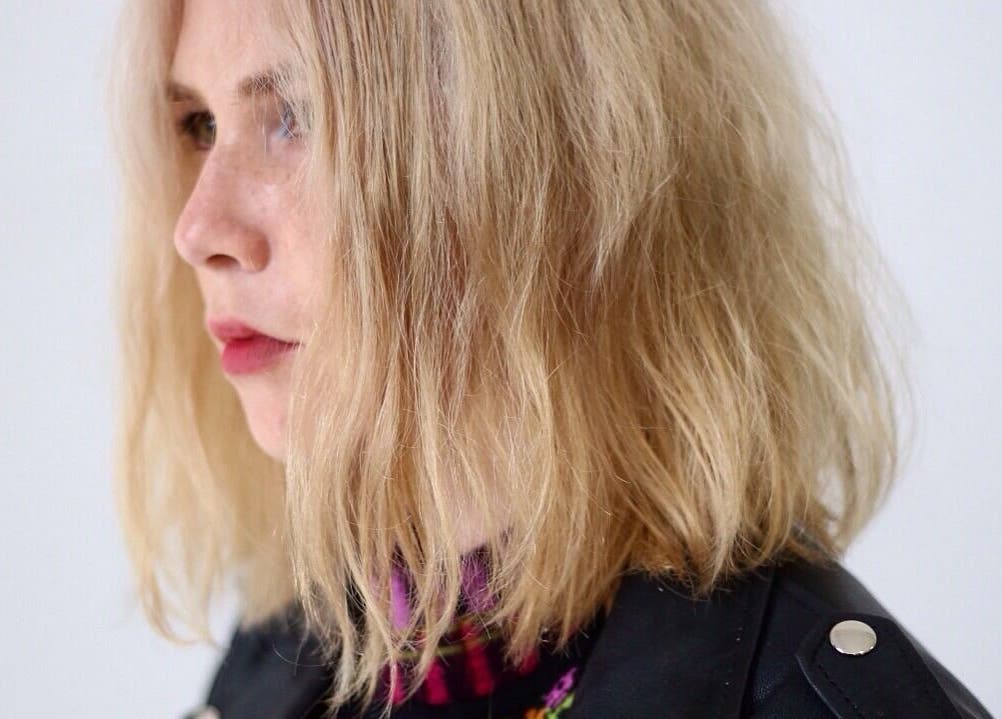 Profile of a blonde woman at David James | Marin, San Rafael, California, US, showcasing trendy hairstyle.