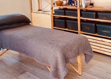 Cozy massage table at Balanced & Blissed - The Retreat, Whitfield, England, GB, offers perfect relaxation.