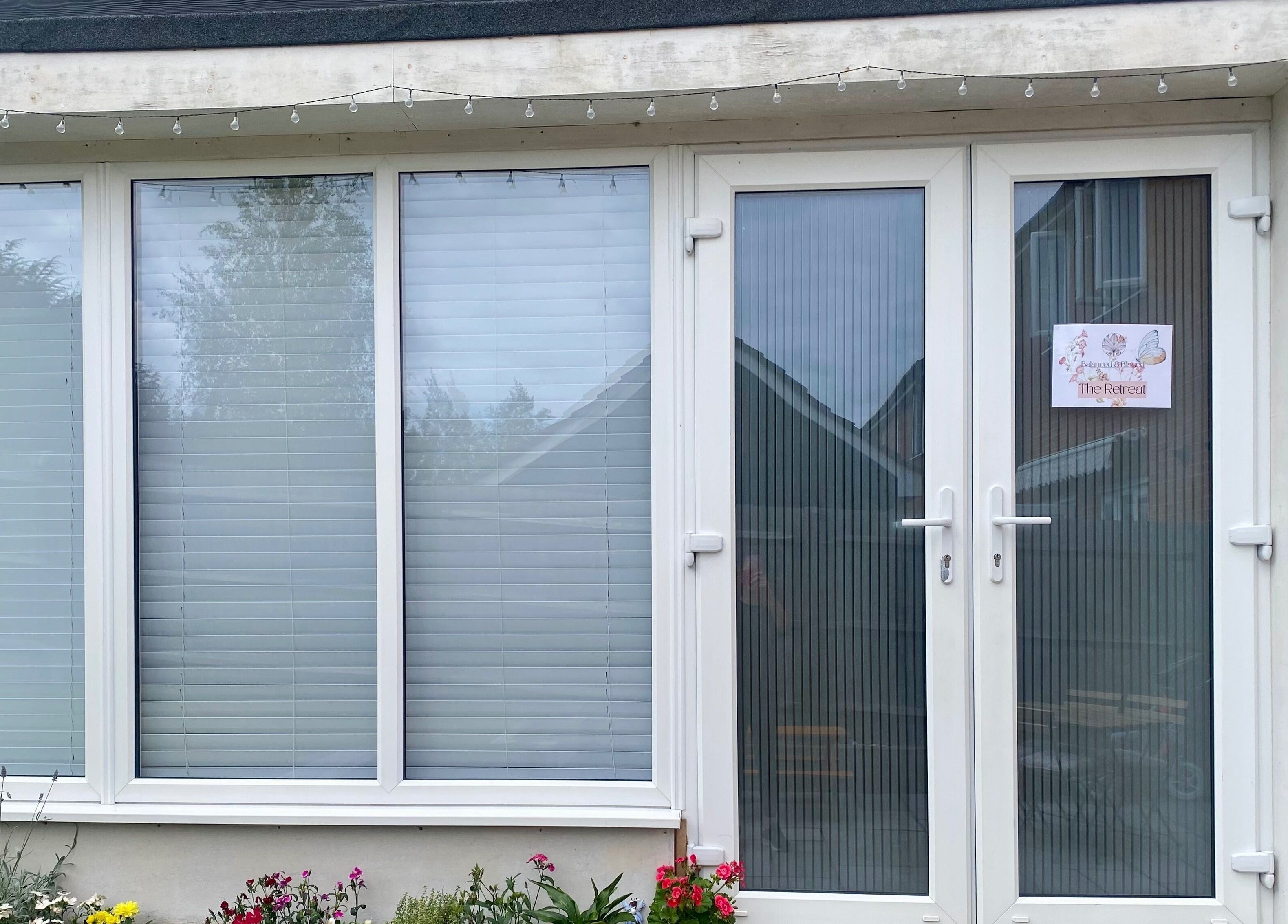 Front view of Balanced & Blissed - The Retreat in Whitfield, England, GB, showcasing inviting entrance decor.