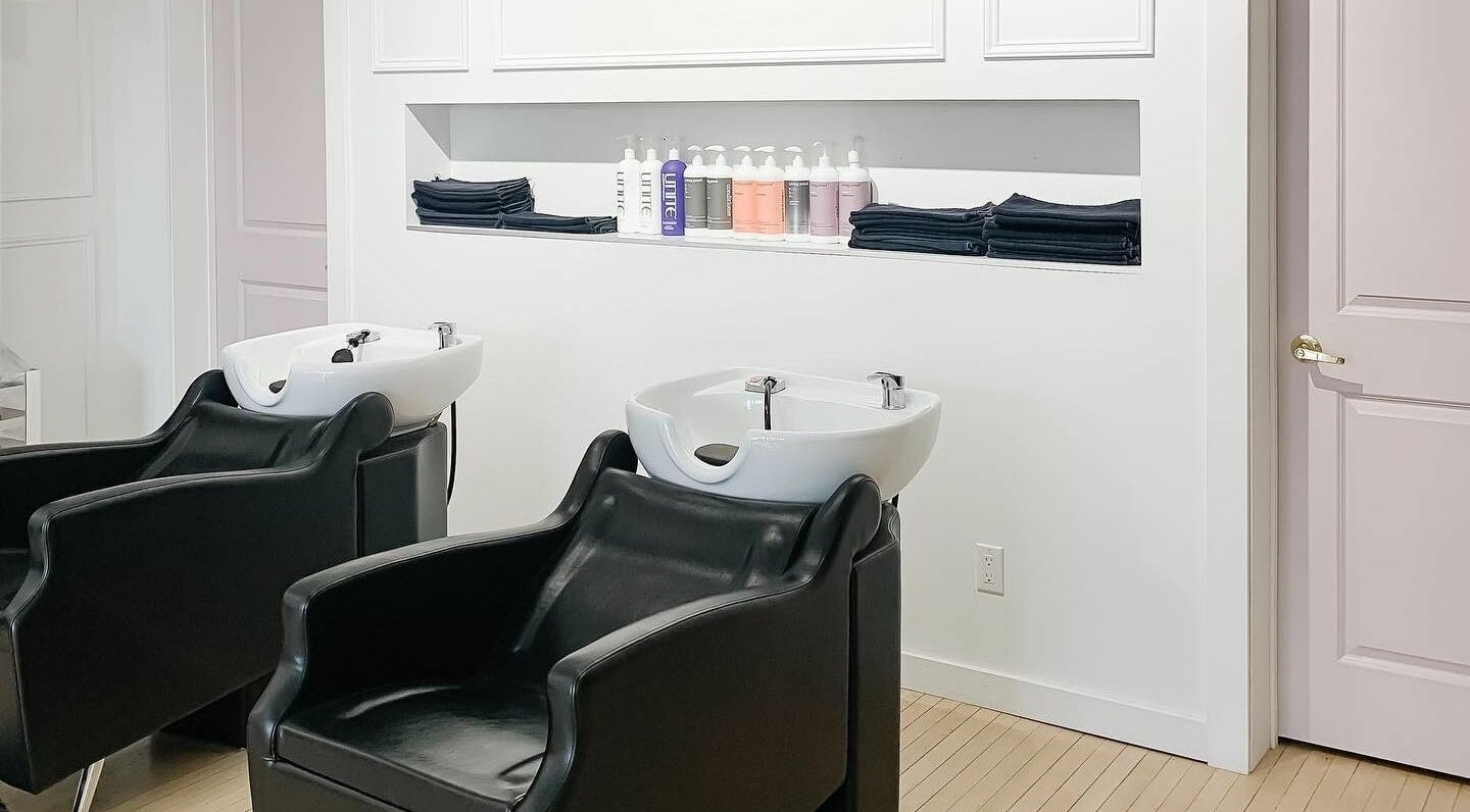 Modern shampoo stations at Posh & Pixie, Kenora, Ontario, CA offering luxurious hair care experience.