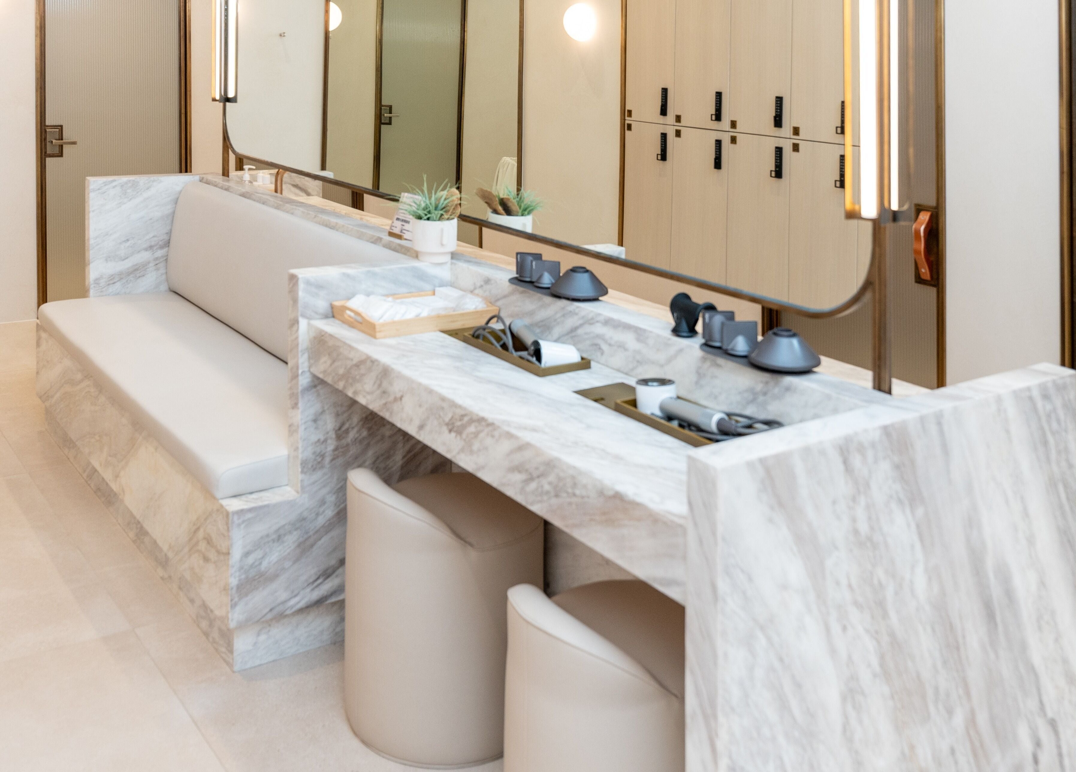 Modern, elegant spa seating and vanity at Pemberley Springs SPA EDEN in Toronto, Ontario, CA.