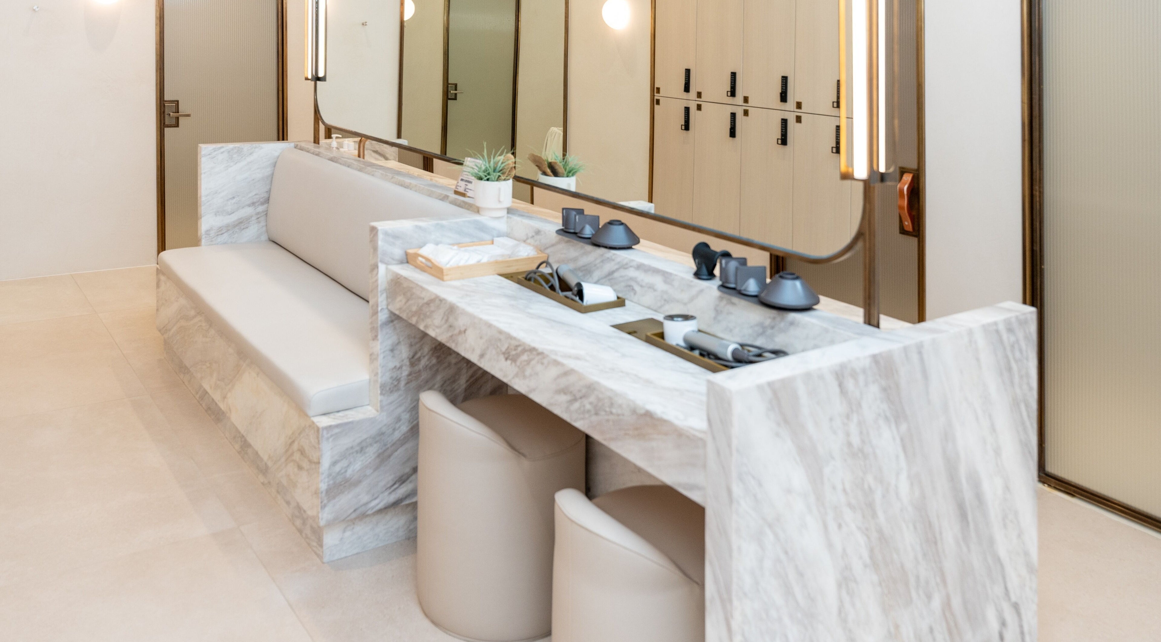 Modern, elegant spa seating and vanity at Pemberley Springs SPA EDEN in Toronto, Ontario, CA.