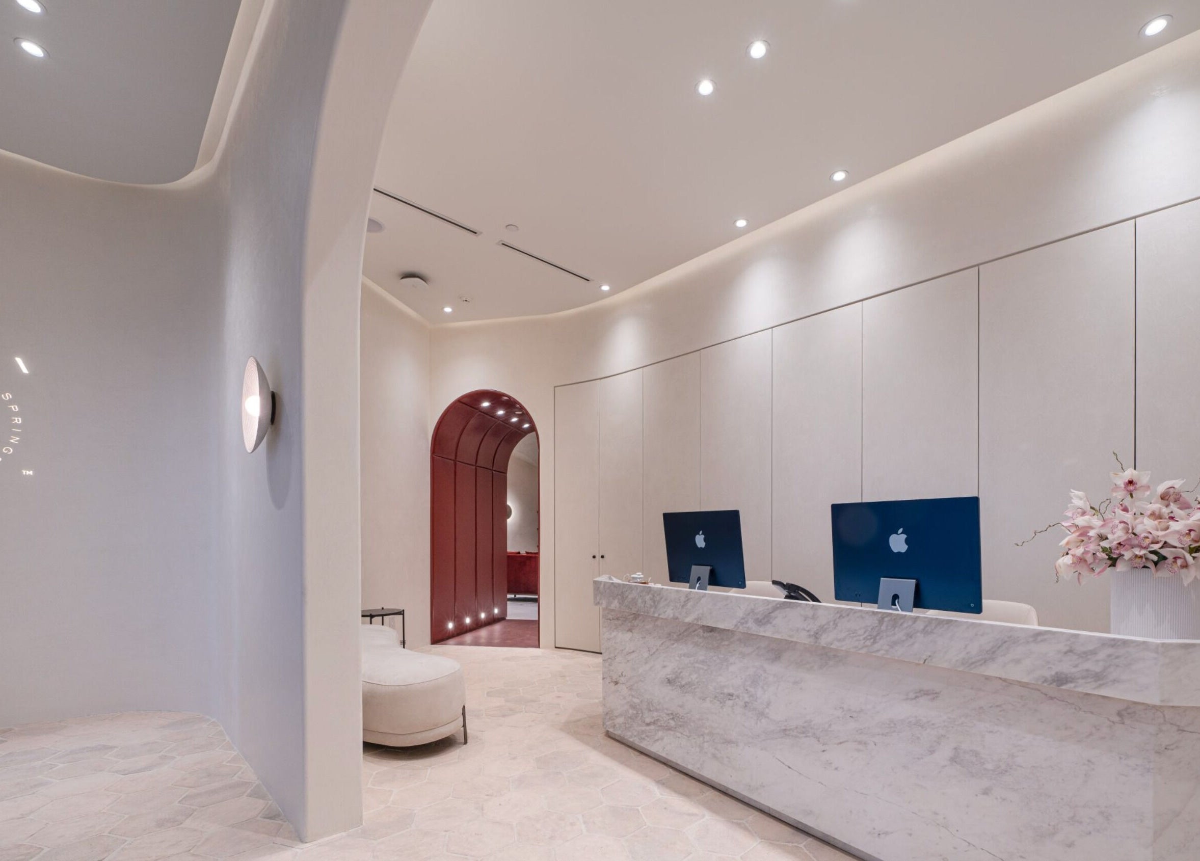 Modern reception area at Pemberley Springs SPA EDEN in Toronto, Ontario, CA with sleek decor and soft lighting.
