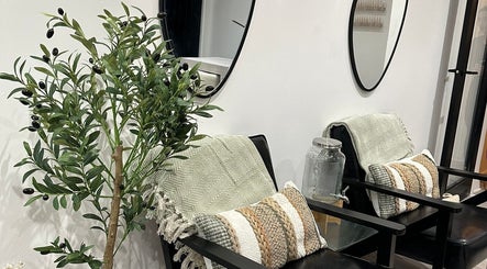 Cozy seating area with plants and cushions at Aaliyahbrookesbeauty, Telford, England, GB.