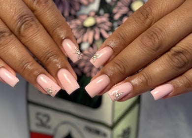 Elegant pink manicured nails with rhinestones at Aaliyahbrookesbeauty, Telford, England, GB.