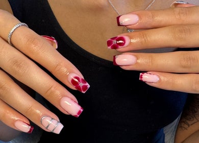 Elegant nail art with pink and red design at Aaliyahbrookesbeauty, Telford, England, GB.