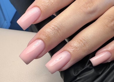 Elegant glossy pink nails styled at Aaliyahbrookesbeauty in Telford, England, GB.